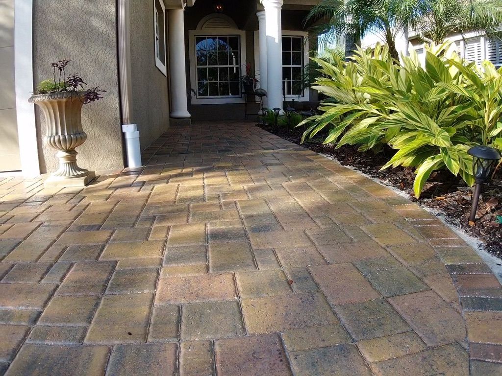 Sealed paver walkway with landscaping