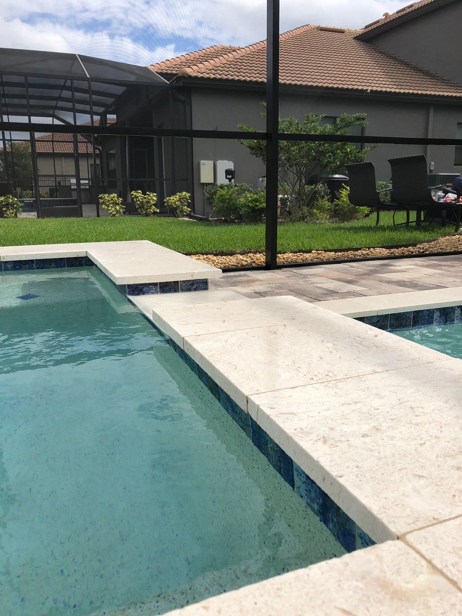 Travertine pool coping cleaned and sealed